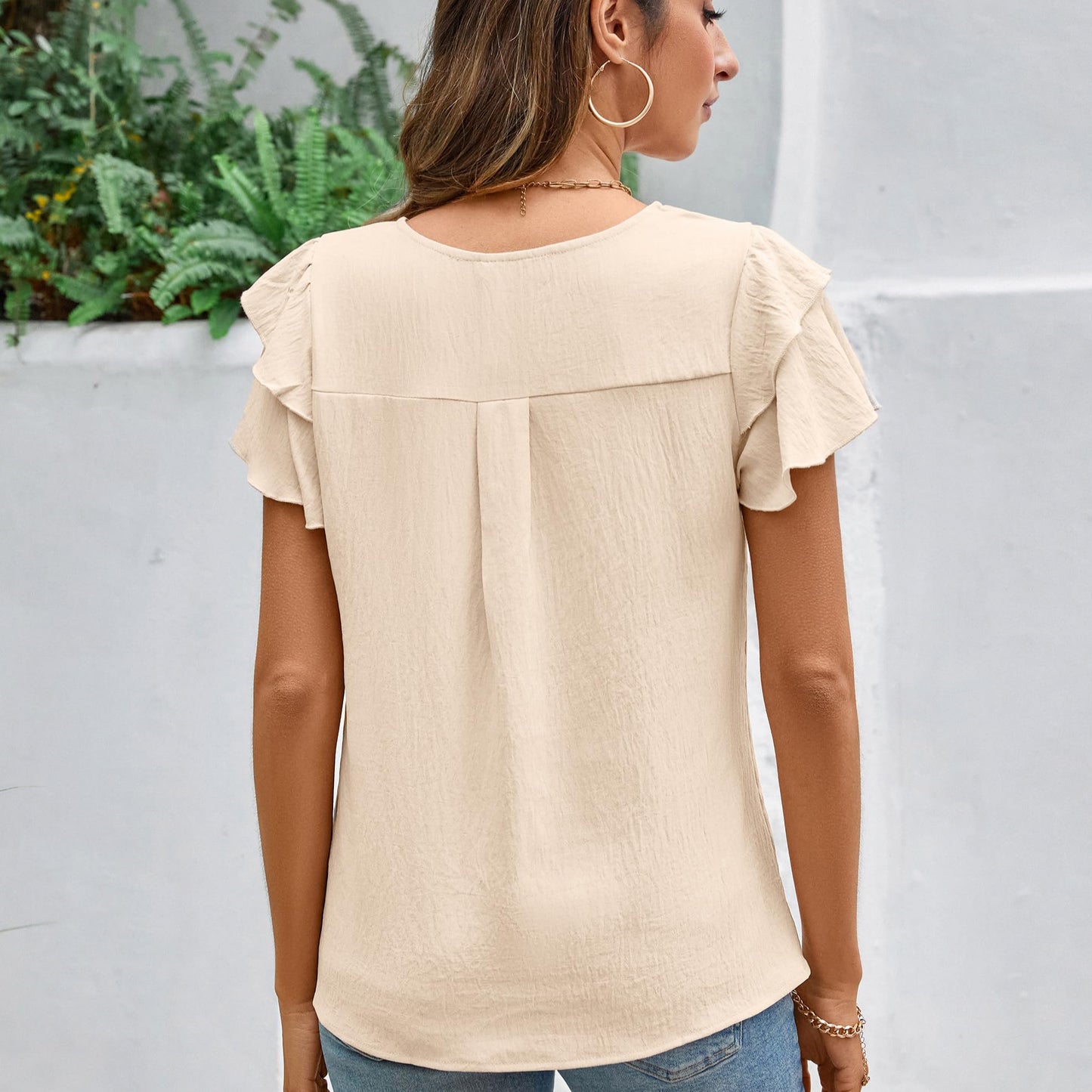Women's Short Sleeve Ruffle Blouse – Dressy & Business Casual (Blooming Jelly) back view on a model