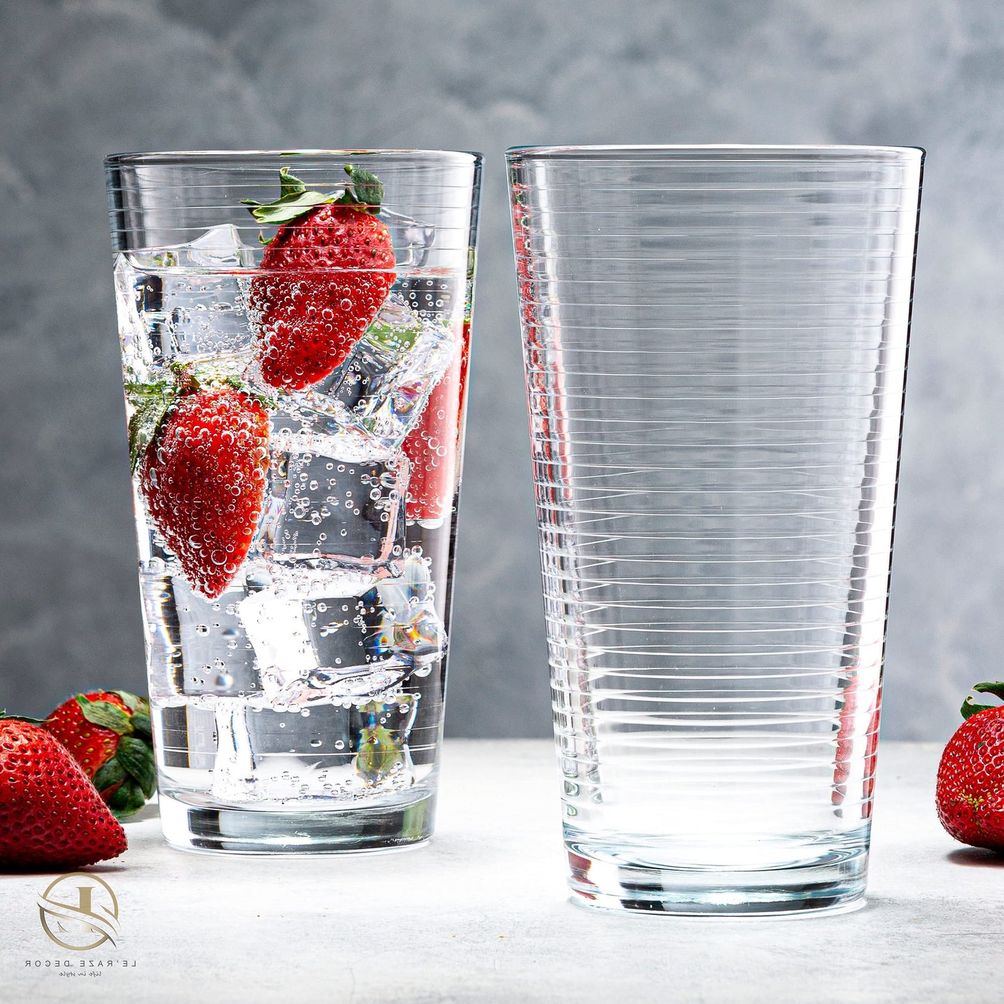 16-Piece Ribbed Glassware Set – 8 Highball & 8 Rocks Glasses – Clear Heavy Base Drinking Cups 2 large glasses with water and strawberries