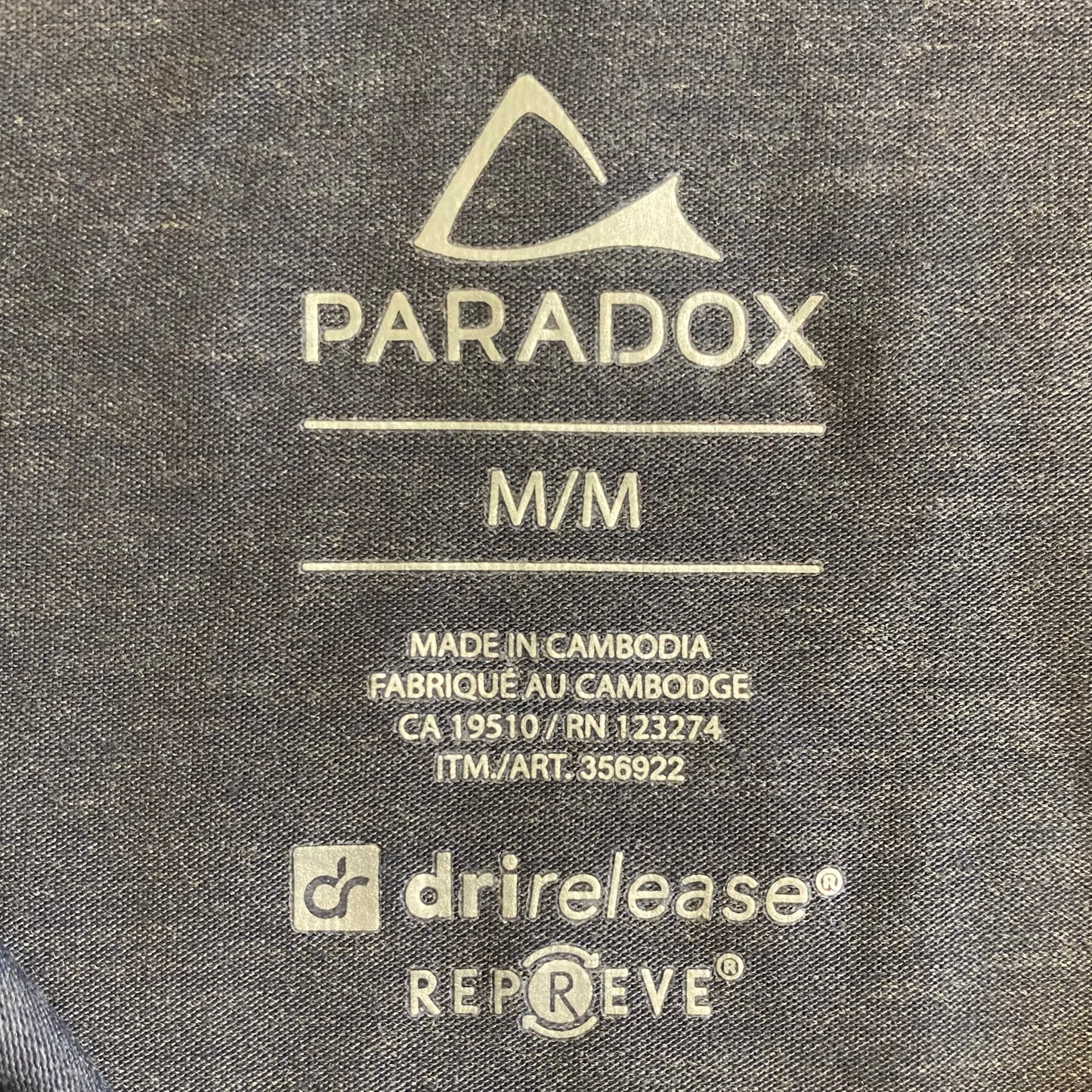 Paradox Women's Black Camouflage Quarter-Zip Pullover – Long Sleeve Activewear, Size Medium close up view of product label