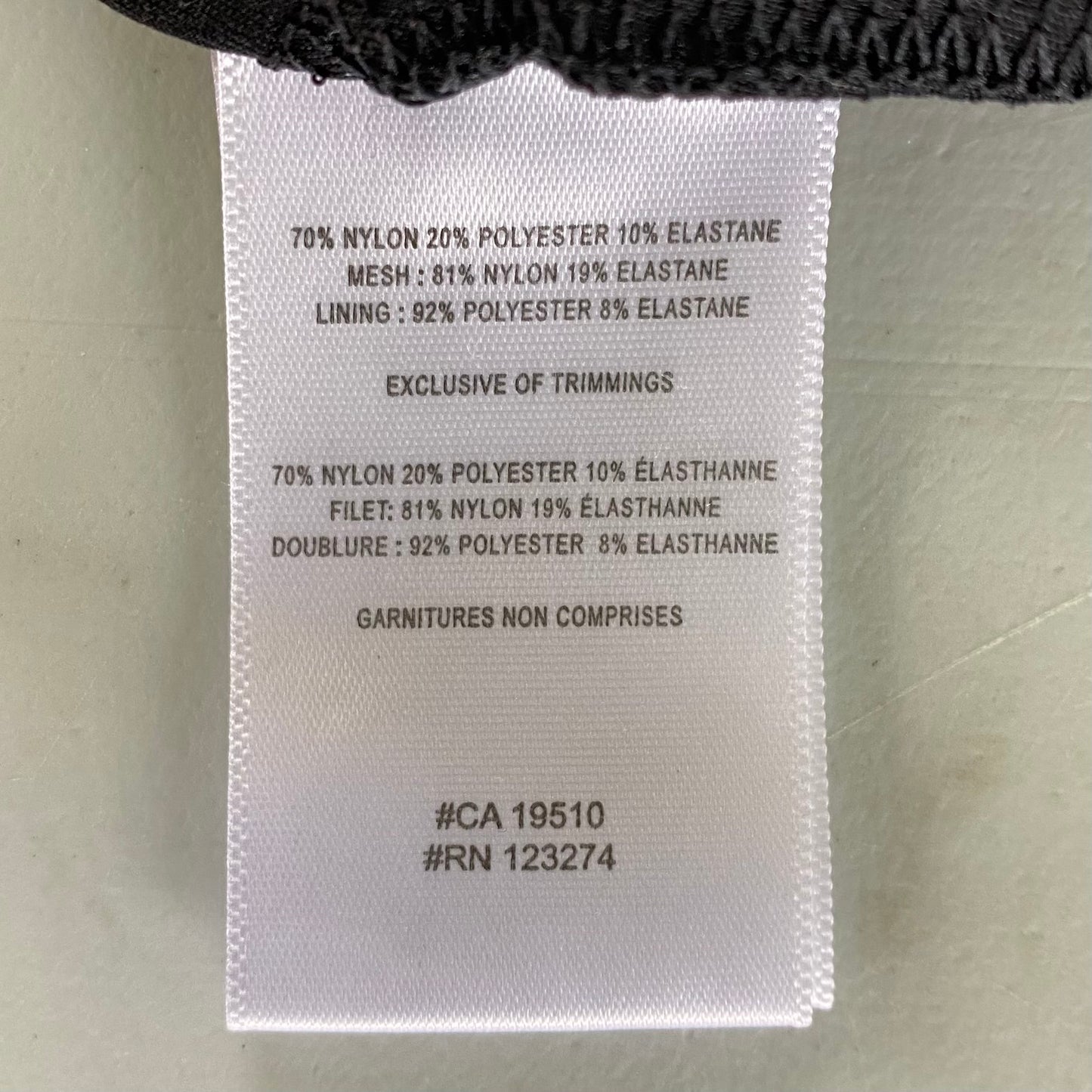 Women's Racerback Sports Bra – Supportive & Moisture-Wicking – Size Large (Lole)garment tag with fabric