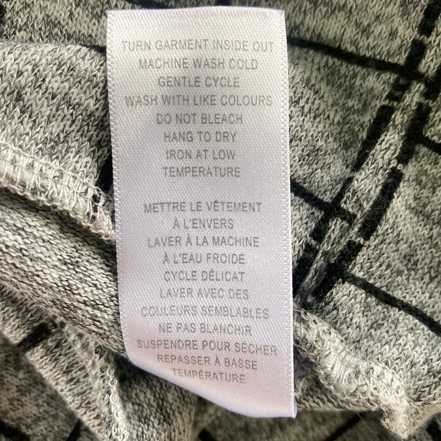 Women's Windowpane Grid Print Sweater – Soft & Stretchy – Size Large (Cleo)garment tag showing care instructions