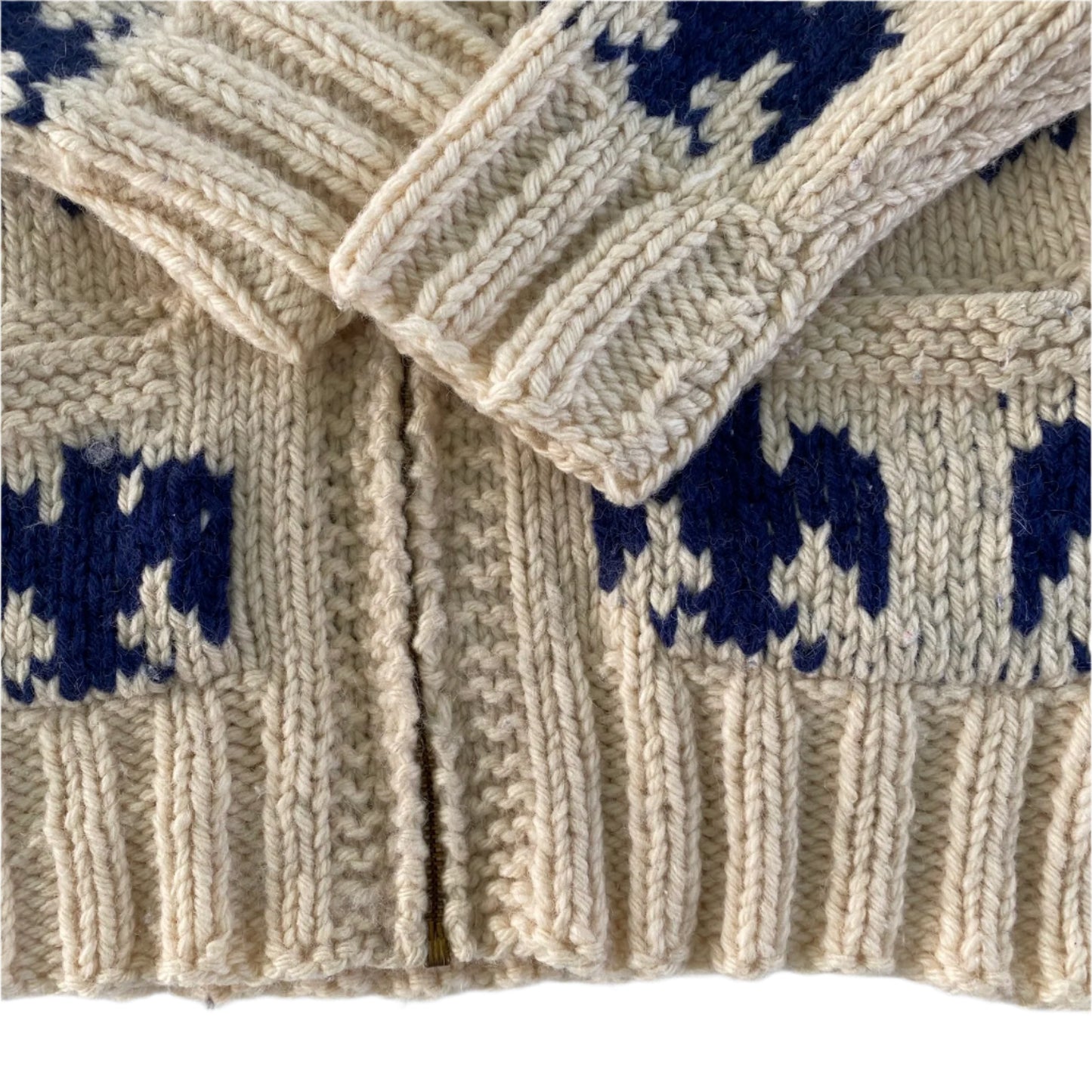 Handmade Cowichan-Style Wool Sweater – Zip-Up – Eagle Motif – Size Medium close up of the cuffs and lower edge