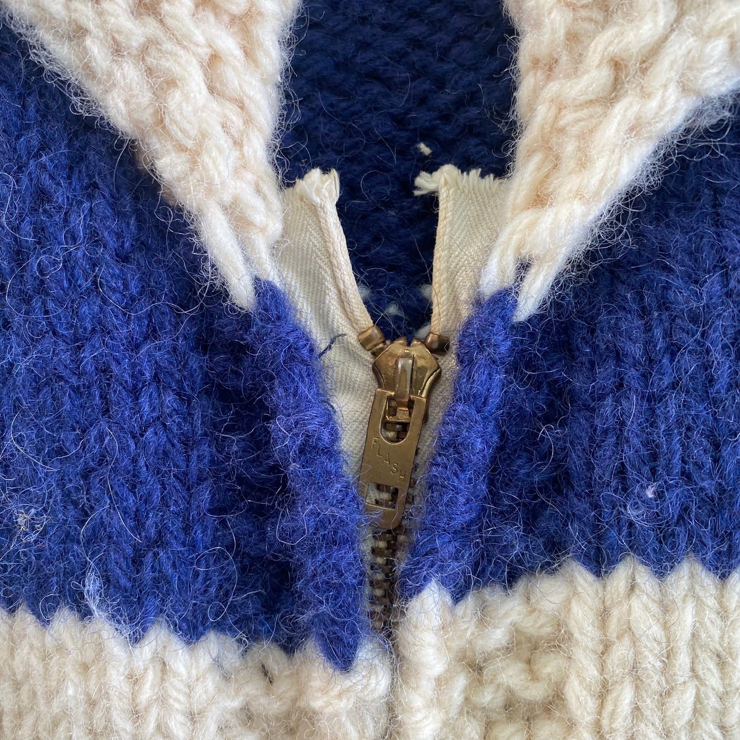 Handmade Cowichan-Style Wool Sweater – Zip-Up – Eagle Motif – Size Medium close up of the zipper