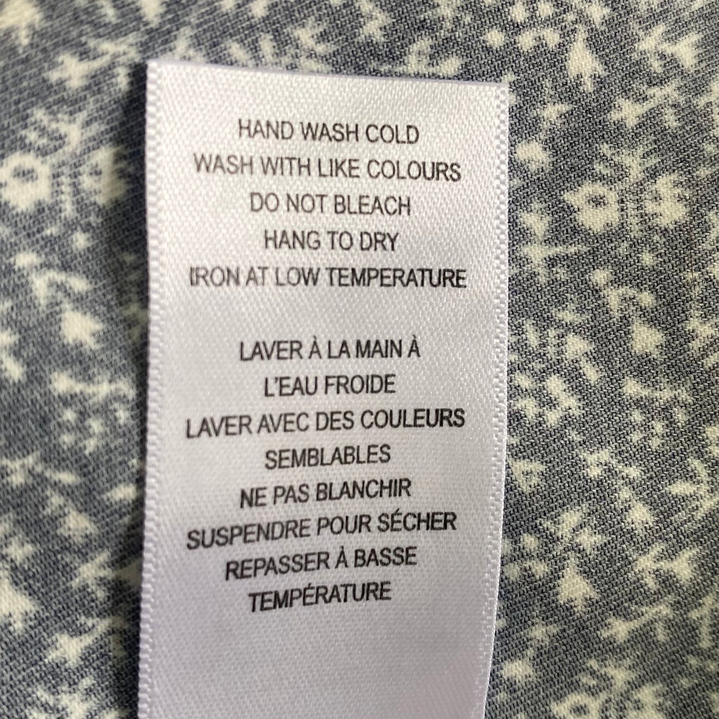 Navy Sleeveless Blouse – Micro Floral Print – Lightweight & Sustainable – Size M (Cleo) garment tag