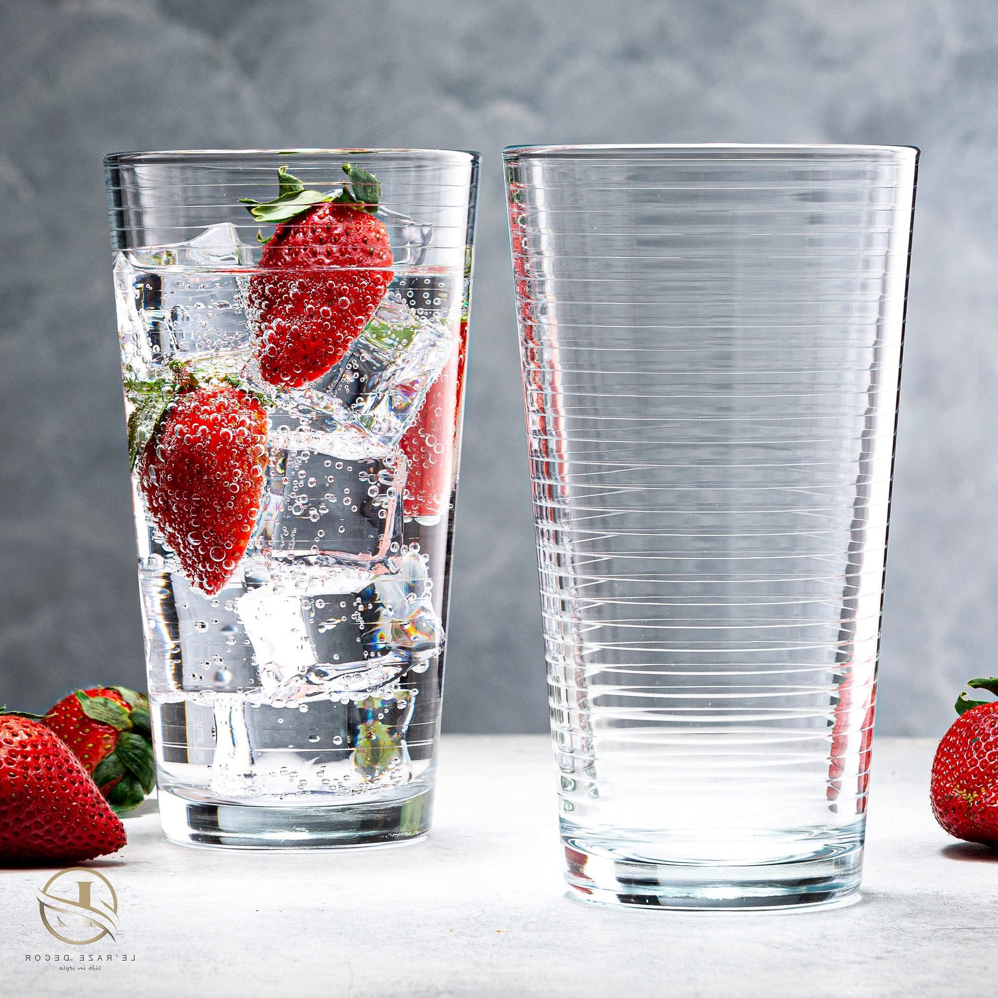 16-Piece Ribbed Glassware Set – 8 Highball & 8 Rocks Glasses – Clear Heavy Base Drinking Cups 2 large glasses with water and strawberries