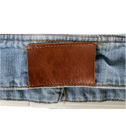 Women's Light Wash Denim Jacket – Fitted & Stretchy – Size Medium (Azur) showing the leather patch on the back