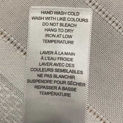 Cleo Women's Pleated 3/4 Sleeve Lined Top – Black & White, Size Large view of care instructions tag