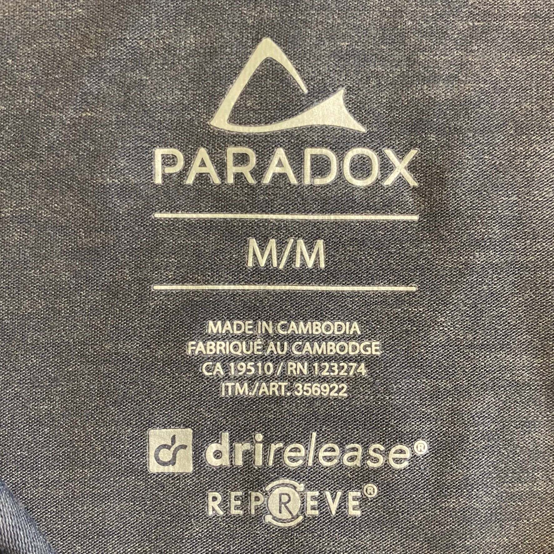Paradox Women's Black Camouflage Quarter-Zip Pullover – Long Sleeve Activewear, Size Medium close up view of product label