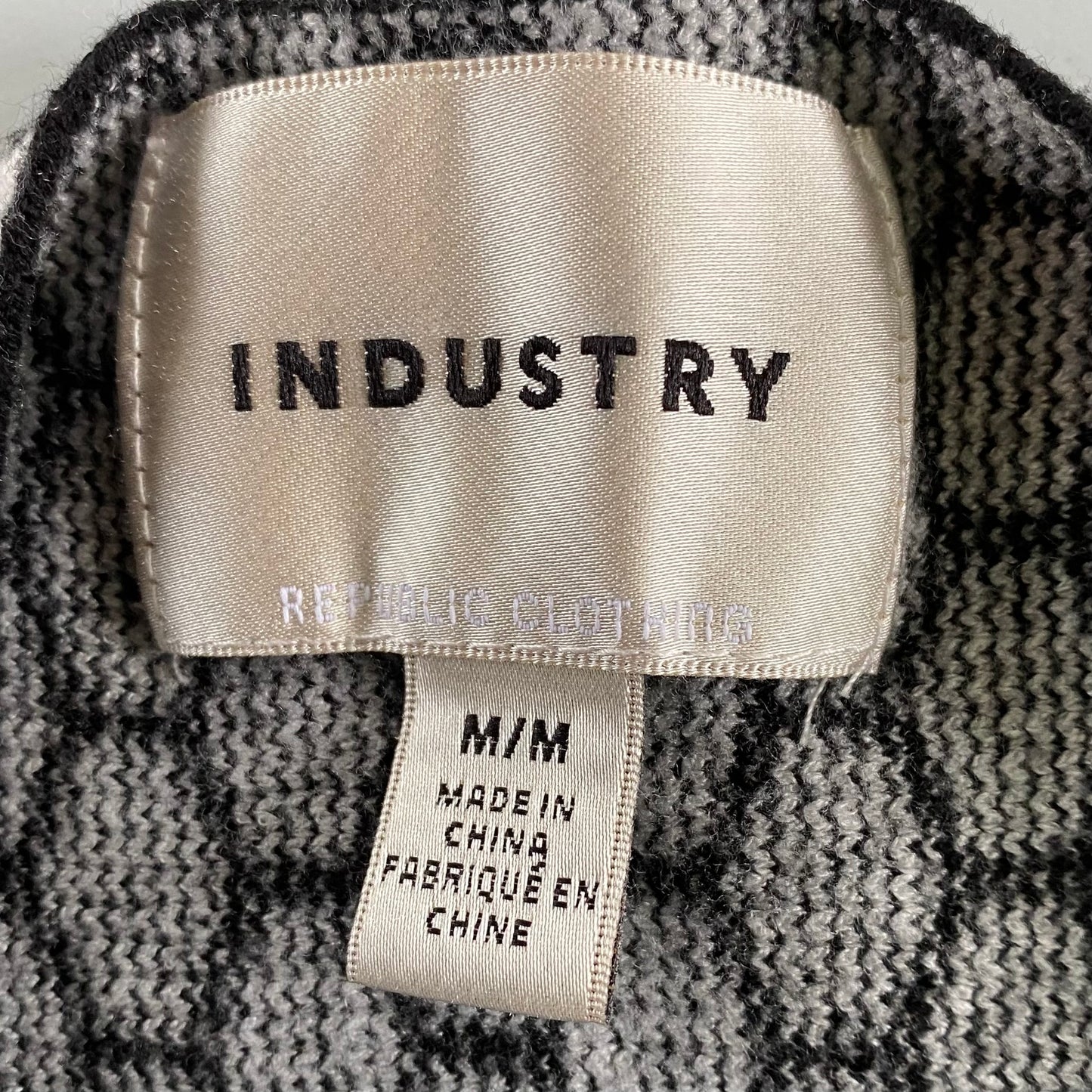 Women's Geometric Knit Sweater – Chic & Cozy – Size Medium (Industry) showing the tag med