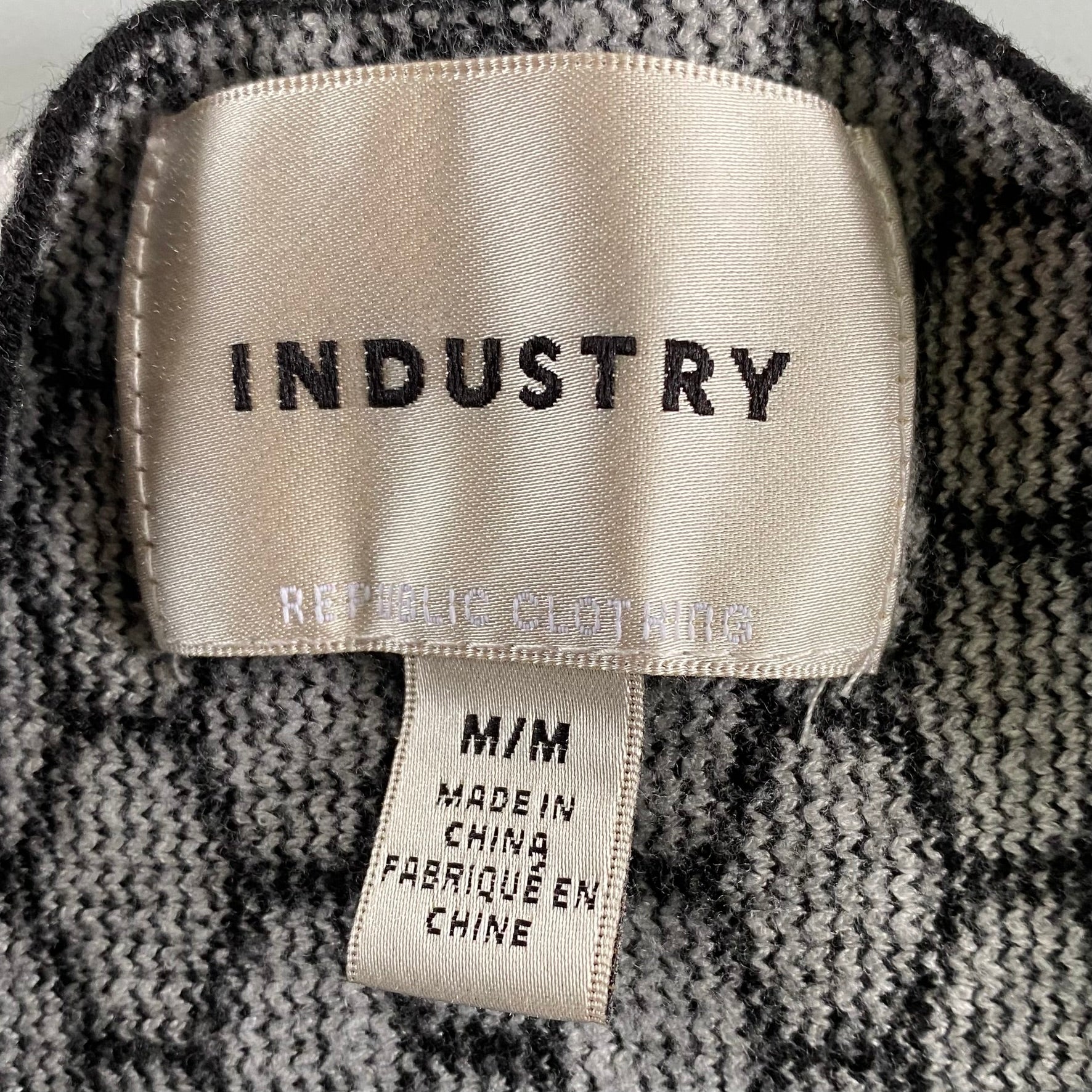 Women's Geometric Knit Sweater – Chic & Cozy – Size Medium (Industry) showing the tag med