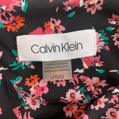 Women’s Sleeveless Floral Pleated Blouse – Size Large [Calvin Klein] showing gament tag