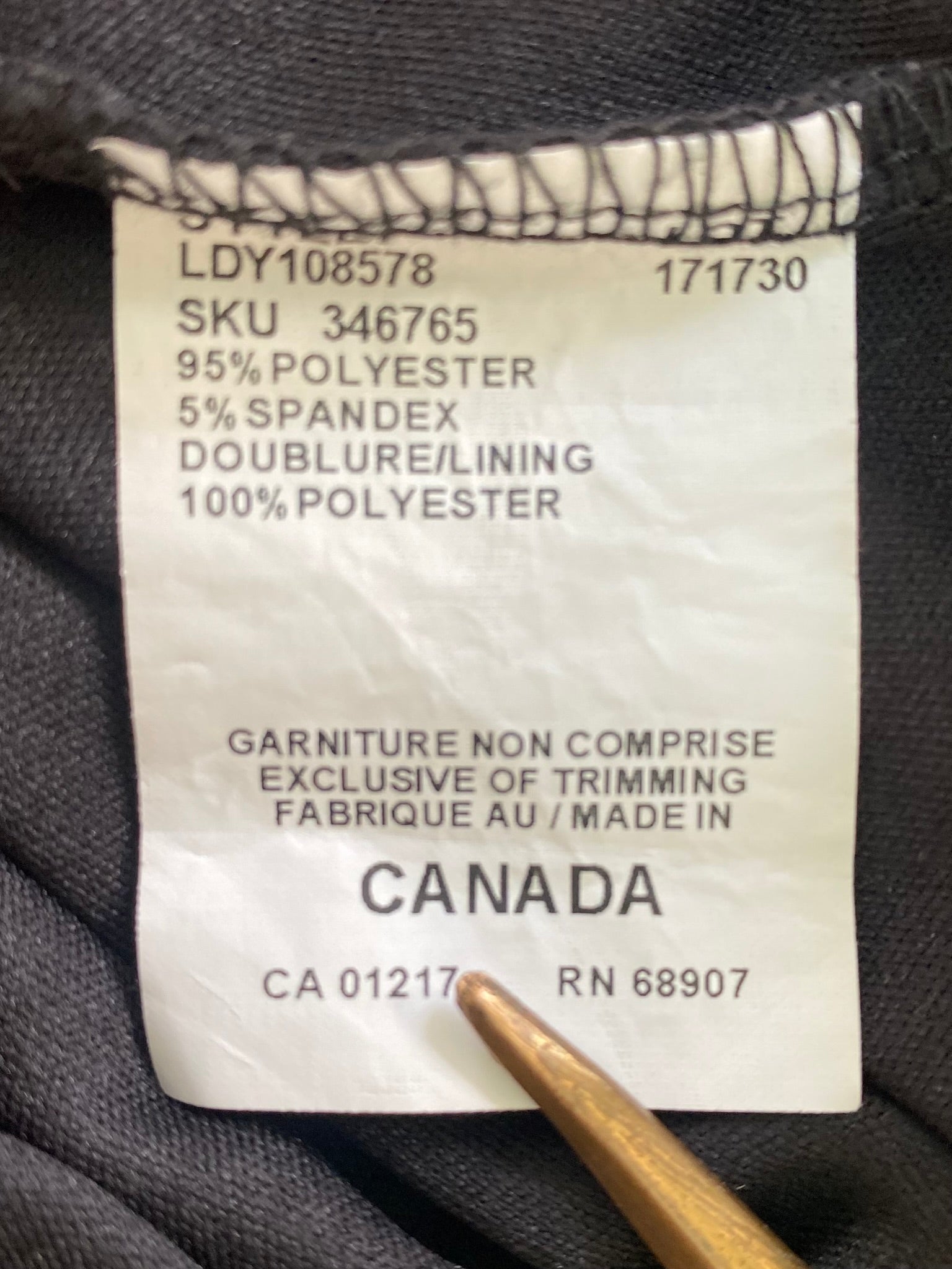Floral Print Sleeveless Dress – Ruched Waist – Made in Canada – Size M (Le Château) garment tag with materials
